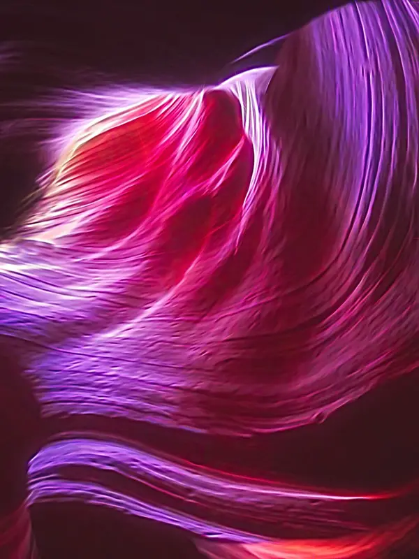 Abstract image with vibrant flowing patterns in pink, purple, and red hues, featuring curvilinear lines and a glowing effect that conveys energy and fluidity.