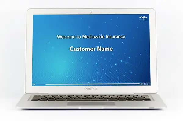 MacBook Air displaying a personalized welcome screen for Mediawide Insurance with a digital-themed background, a welcome message, and a placeholder for a customer's name.